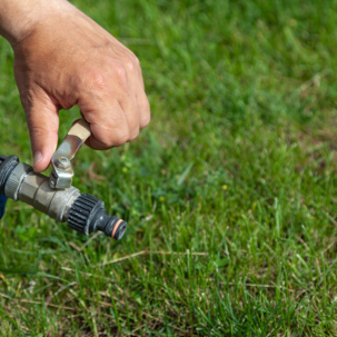 someone testing a backflow preventer